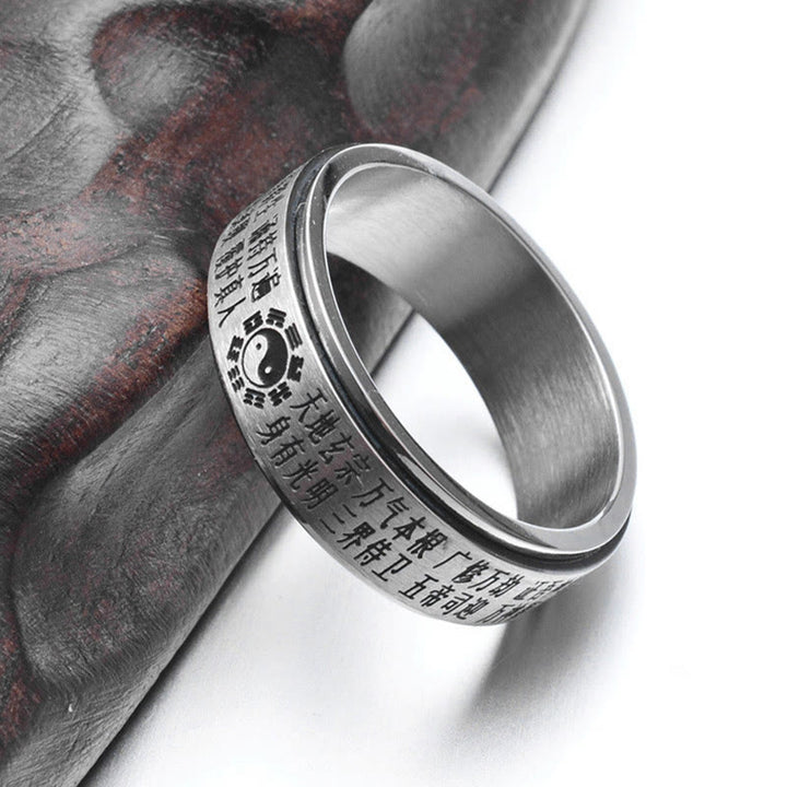 Anillo giratorio de equilibrio de acero de titanio con caracteres chinos Bagua Yin Yang y Buddha Stones