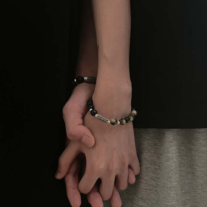 Pulsera de amor y fuerza con seis palabras verdaderas "Om Mani Padme Hum" y obsidiana negra natural con Buddha Stones y ojo de tigre