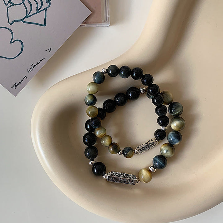 Pulsera de amor y fuerza con seis palabras verdaderas "Om Mani Padme Hum" y obsidiana negra natural con Buddha Stones y ojo de tigre