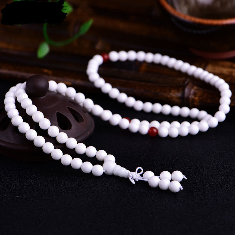 Pulsera de la paciencia con seis palabras verdaderas 'Om Mani Padme Hum' de porcelana blanca con 108 cuentas de Buddha Stones
