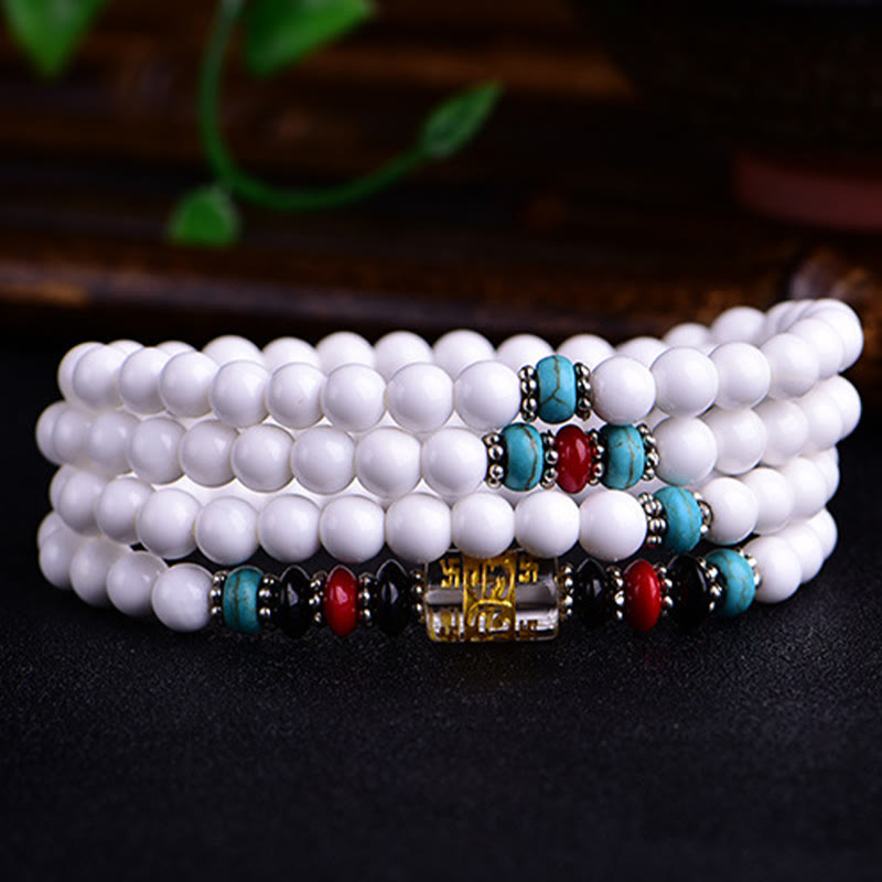 Pulsera de la paciencia con seis palabras verdaderas 'Om Mani Padme Hum' de porcelana blanca con 108 cuentas de Buddha Stones