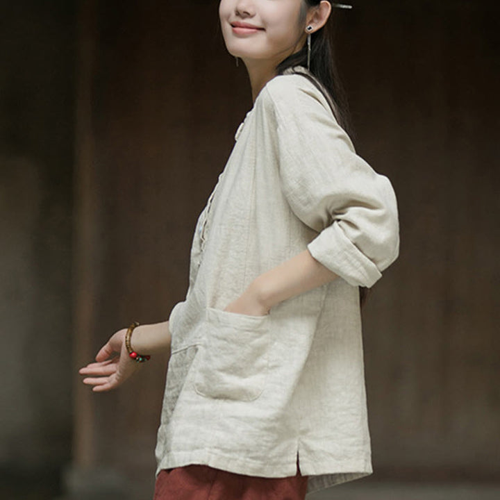 Camisa de mujer de lino y ramio con manga larga y medio botón de color liso con Buddha Stones