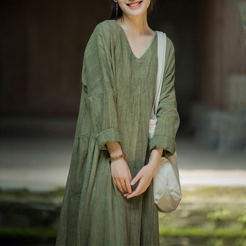 Vestido midi de lino y ramio con cuello en V, manga larga y color liso con Buddha Stones