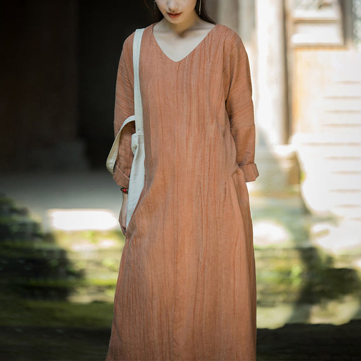 Vestido midi de lino y ramio con cuello en V, manga larga y color liso con Buddha Stones