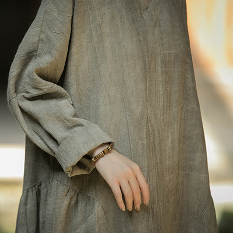 Vestido midi de lino y ramio con cuello en V, manga larga y color liso con Buddha Stones