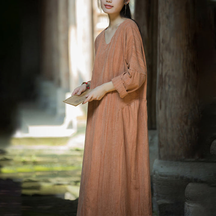 Vestido midi de lino y ramio con cuello en V, manga larga y color liso con Buddha Stones