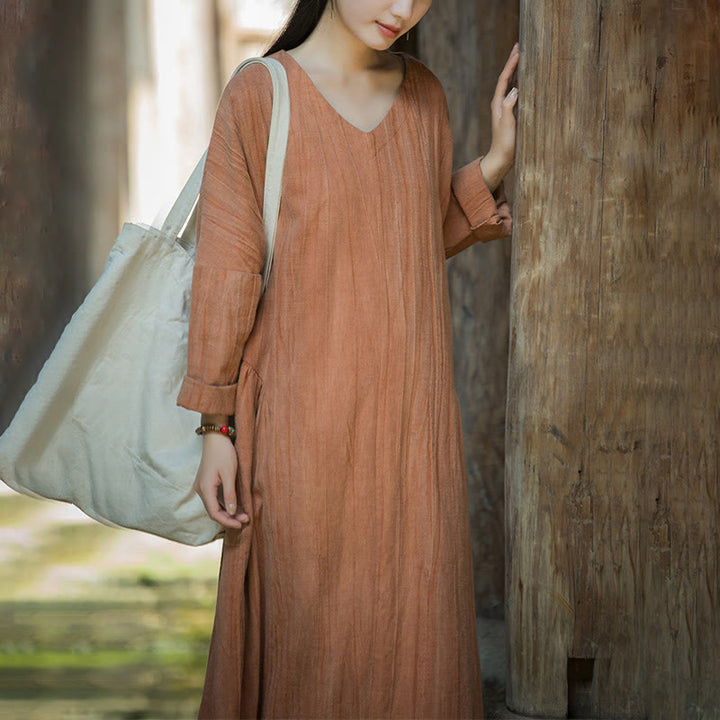 Vestido midi de lino y ramio con cuello en V, manga larga y color liso con Buddha Stones