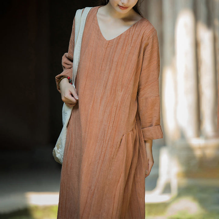 Vestido midi de lino y ramio con cuello en V, manga larga y color liso con Buddha Stones
