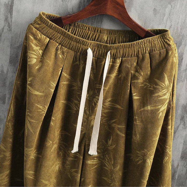 Pantalones anchos de pana con cordón de algodón y hojas de bambú y Buddha Stones para hombre con bolsillos