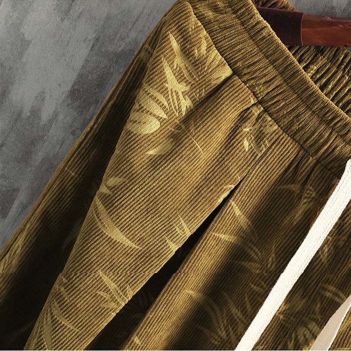 Pantalones anchos de pana con cordón de algodón y hojas de bambú y Buddha Stones para hombre con bolsillos