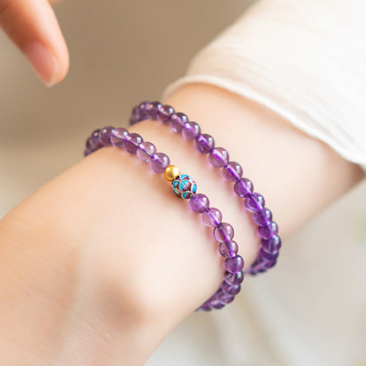 Pulsera de conciencia espiritual con loto y amatista natural de Buddha Stones
