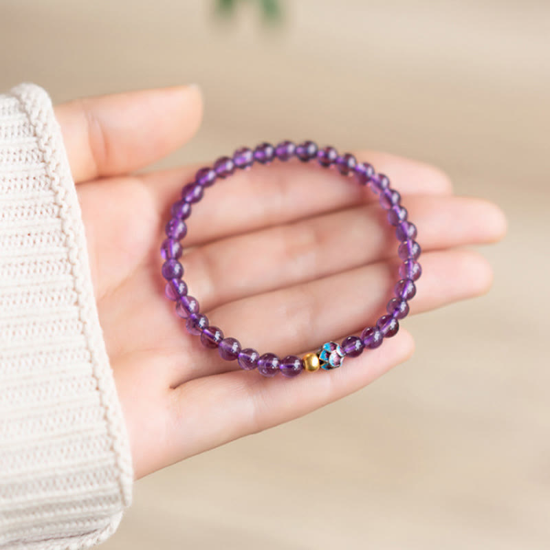 Pulsera de conciencia espiritual con loto y amatista natural de Buddha Stones