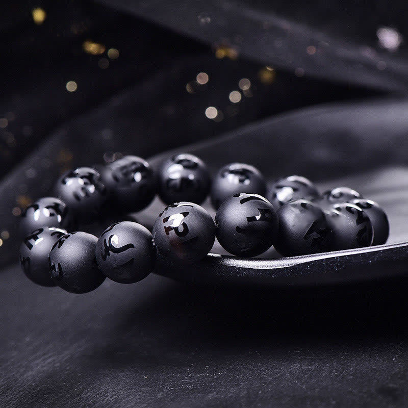 Pulsera de protección tallada con Om Mani Padme Hum y ónix negro natural de Buddha Stones