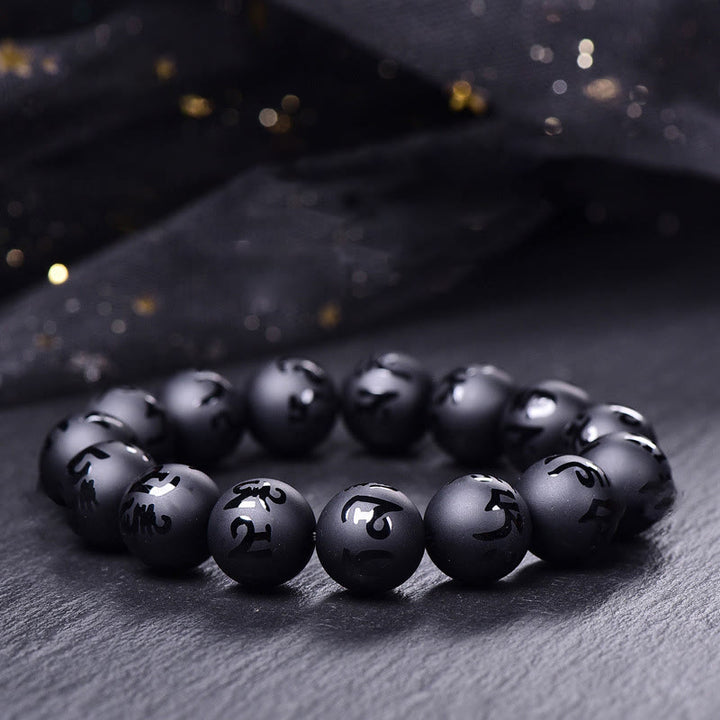 Pulsera de protección tallada con Om Mani Padme Hum y ónix negro natural de Buddha Stones