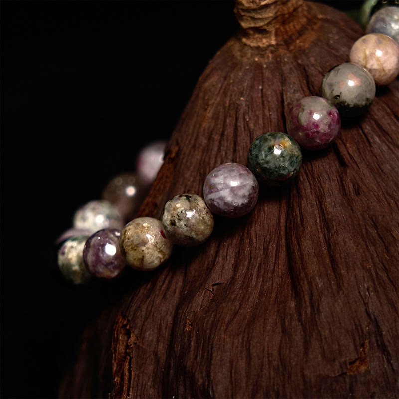 Pulsera positiva de turmalina arcoíris con Buddha Stones