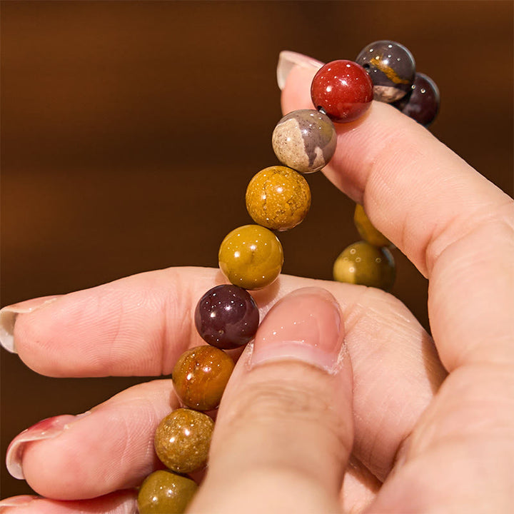 Pulsera de crecimiento emocional de mokaíta con Buddha Stones