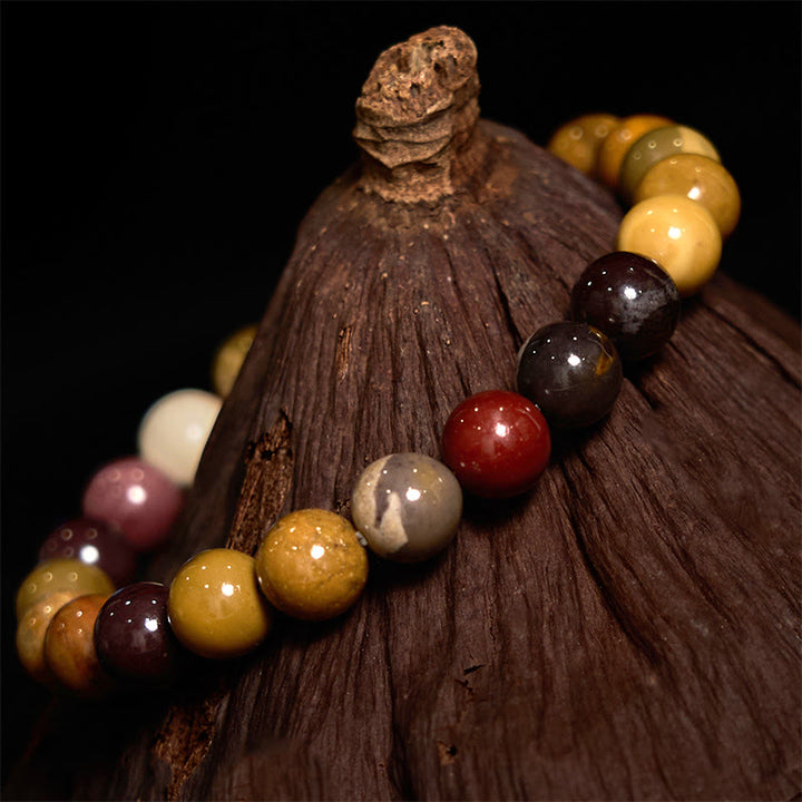 Pulsera de crecimiento emocional de mokaíta con Buddha Stones