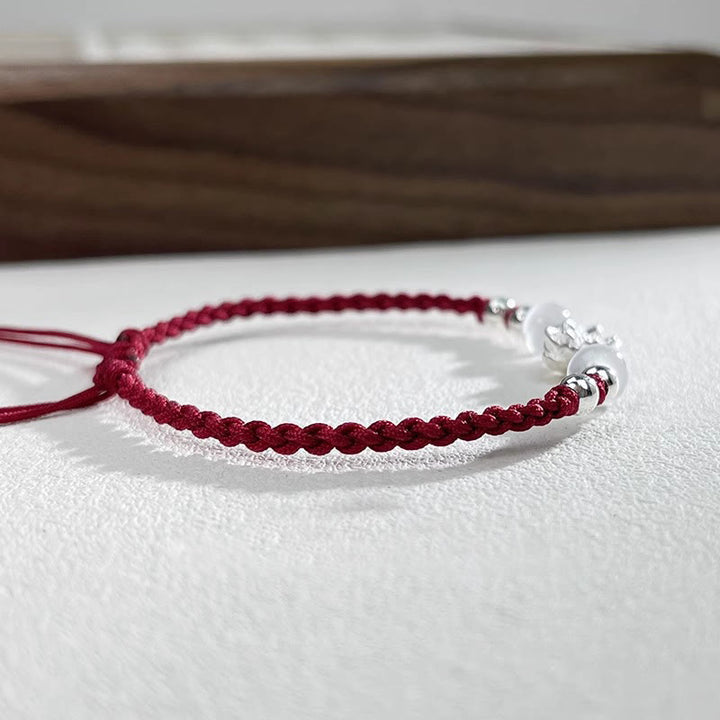 Pulsera de hilo de protección con cuentas de ojo de gato y diseño de loto en plata de ley 999 con Buddha Stones - image 14