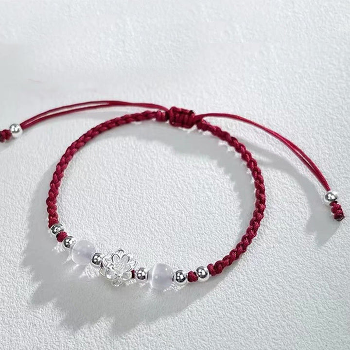 Pulsera de hilo de protección con cuentas de ojo de gato y diseño de loto en plata de ley 999 con Buddha Stones