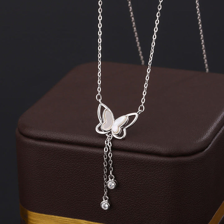 Collar con colgante de mariposa y piedra Tridacna de plata de ley 999 con Buddha Stones