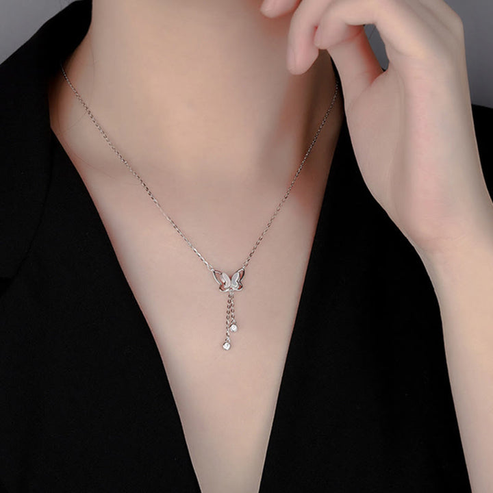 Collar con colgante de mariposa y piedra Tridacna de plata de ley 999 con Buddha Stones