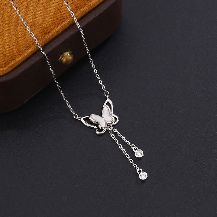 Collar con colgante de mariposa y piedra Tridacna de plata de ley 999 con Buddha Stones