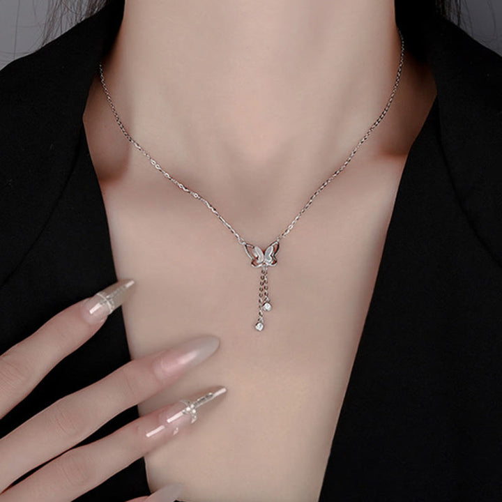 Collar con colgante de mariposa y piedra Tridacna de plata de ley 999 con Buddha Stones