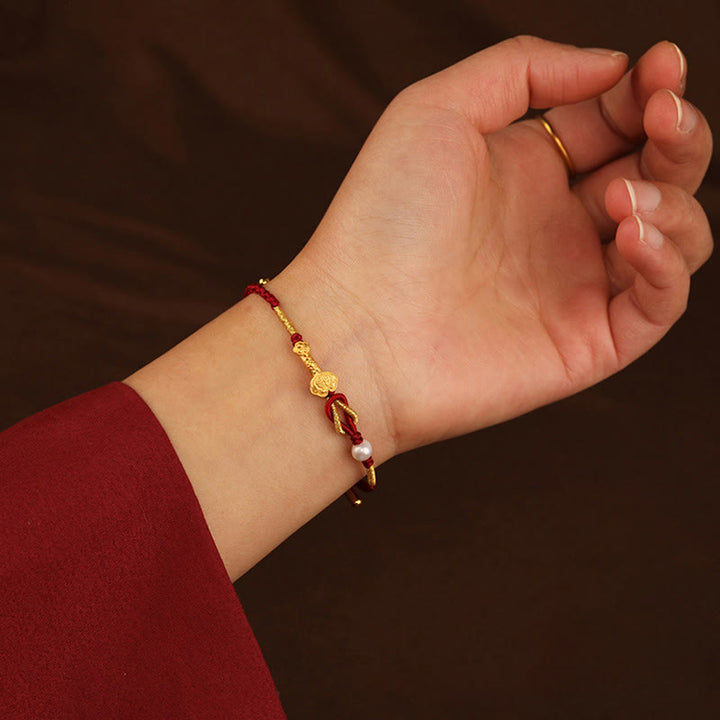 Pulsera trenzada de la suerte con perlas de conejo y mango de Ruyi del deseo de oro de 24 quilates con Buddha Stones