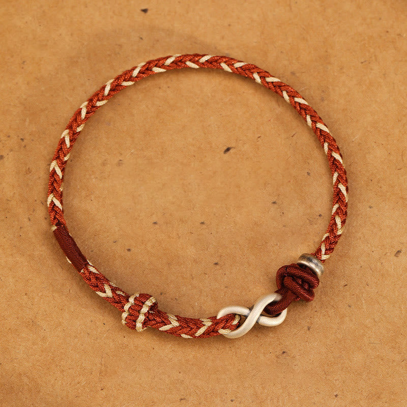 Pulsera de cuerda con símbolo de la suerte y nudo infinito hecha a mano en plata de ley 999 con Buddha Stones