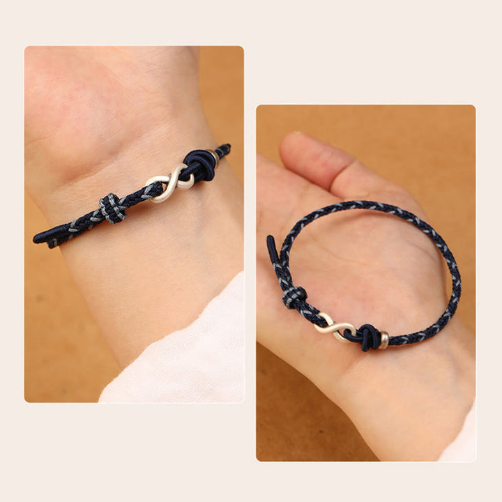 Pulsera de cuerda con símbolo de la suerte y nudo infinito hecha a mano en plata de ley 999 con Buddha Stones