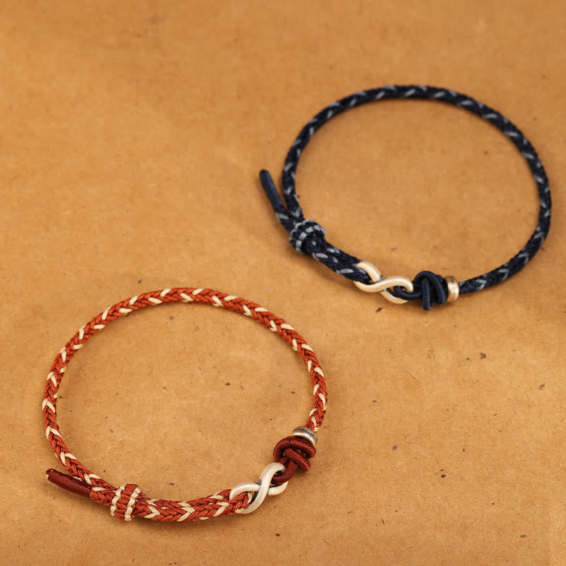 Pulsera de cuerda con símbolo de la suerte y nudo infinito hecha a mano en plata de ley 999 con Buddha Stones