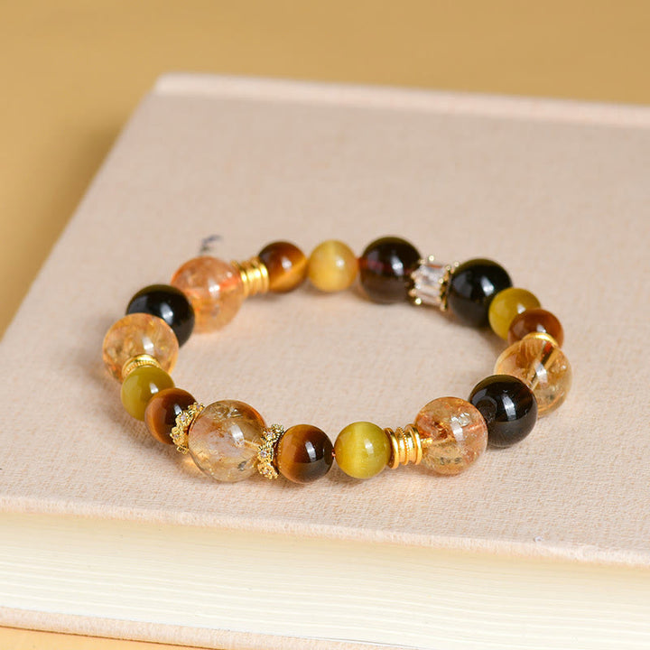 Pulsera de prosperidad con cristales Duobao de ojo de tigre, cuarzo ahumado y citrino natural de Buddha Stones