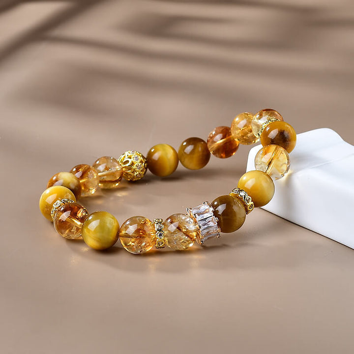 Pulsera de fuerza y coraje con cuentas de citrino y ojo de tigre natural de Buddha Stones