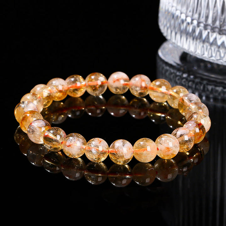 Pulsera de prosperidad con copos de nieve de cristal citrino natural de Buddha Stones
