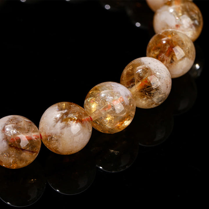Pulsera de prosperidad con copos de nieve de cristal citrino natural de Buddha Stones