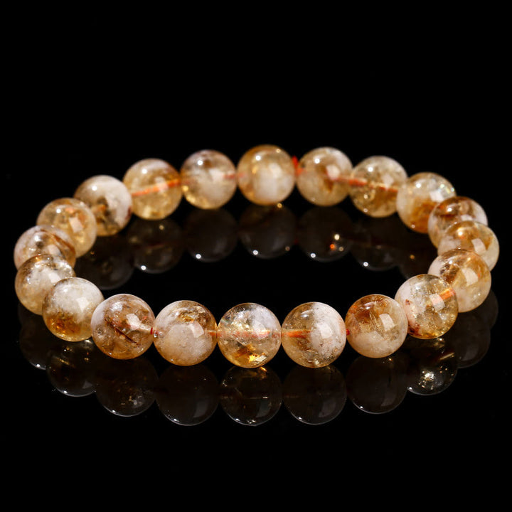 Pulsera de prosperidad con copos de nieve de cristal citrino natural de Buddha Stones