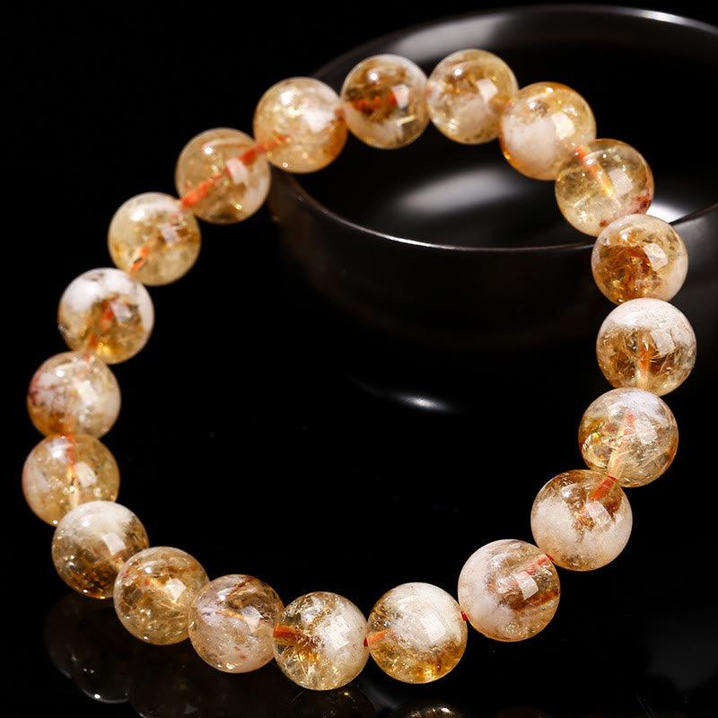Pulsera de prosperidad con copos de nieve de cristal citrino natural de Buddha Stones