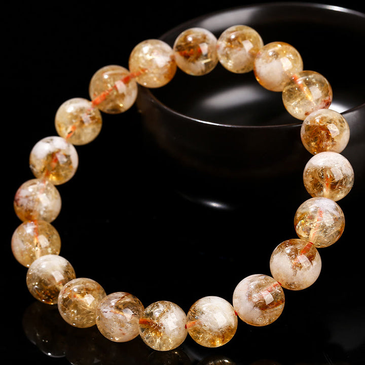 Pulsera de prosperidad con copos de nieve de cristal citrino natural de Buddha Stones