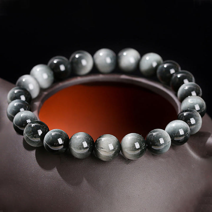 Pulsera positiva de piedra de ojo de águila natural de Buddha Stones