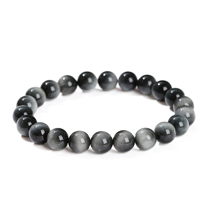Pulsera positiva de piedra de ojo de águila natural de Buddha Stones