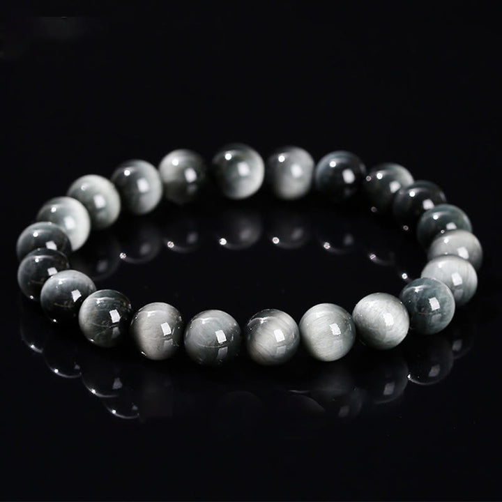 Pulsera positiva de piedra de ojo de águila natural de Buddha Stones