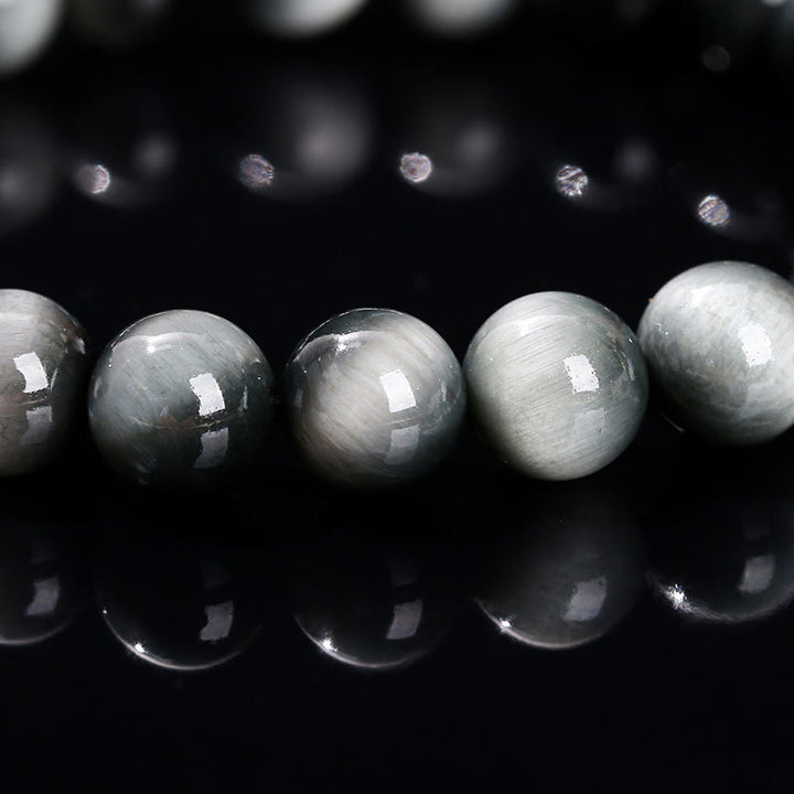 Pulsera positiva de piedra de ojo de águila natural de Buddha Stones