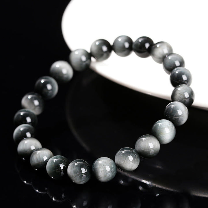 Pulsera positiva de piedra de ojo de águila natural de Buddha Stones