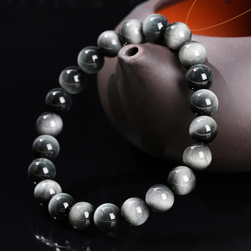 Pulsera positiva de piedra de ojo de águila natural de Buddha Stones