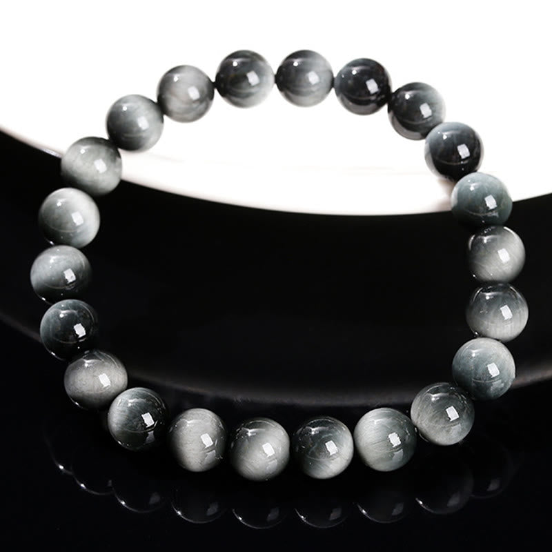 Pulsera positiva de piedra de ojo de águila natural de Buddha Stones