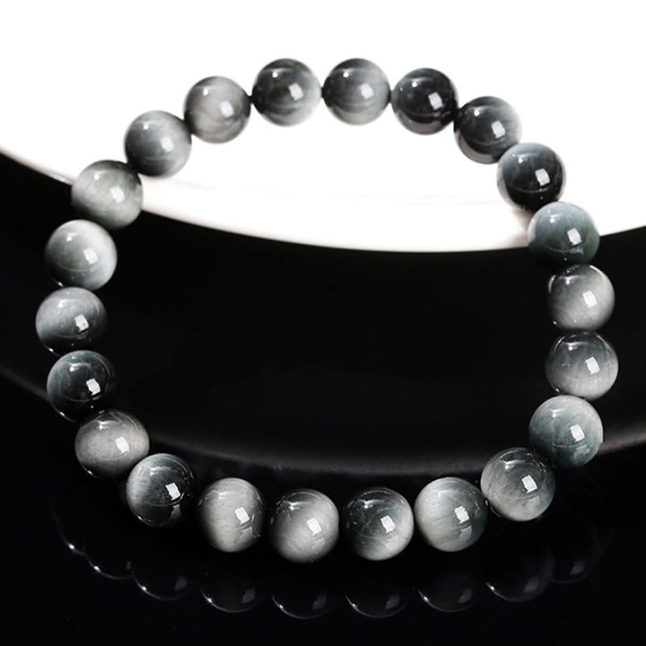Pulsera positiva de piedra de ojo de águila natural de Buddha Stones