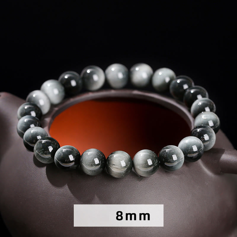 Pulsera positiva de piedra de ojo de águila natural de Buddha Stones