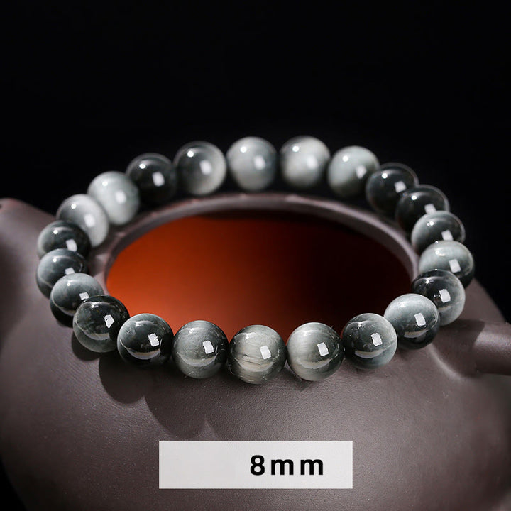 Pulsera positiva de piedra de ojo de águila natural de Buddha Stones