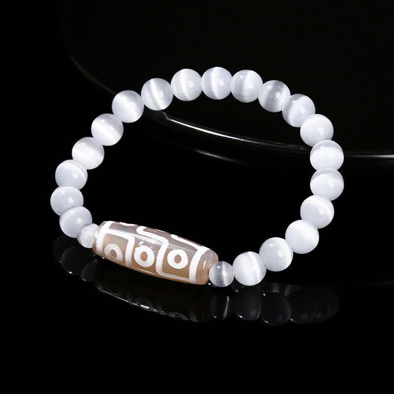 Pulsera de protección de energía con Buddha Stones de nueve ojos tibetanas de sándalo natural y ágata de ojo de gato blanca