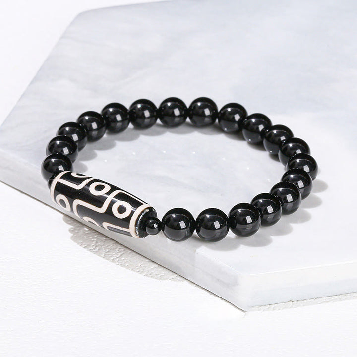 Pulsera de protección de energía con Buddha Stones de nueve ojos tibetanas de sándalo natural y ágata de ojo de gato blanca